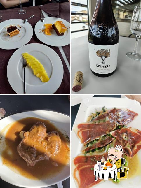 Sarbil review photo with sliced cured ham and other dishes
