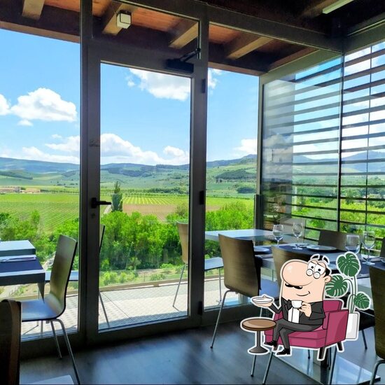 Sarbil review photo showing restaurant terrace and views